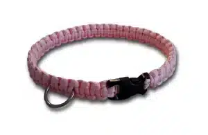 A handmade dog collar braided with pink paracord 550 in the cobra knot style